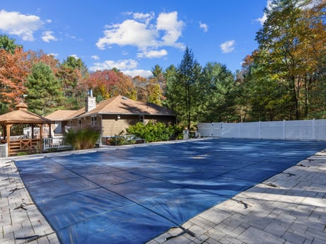 An image featuring cloud, sky, plant, property, building, window, shade, tree, road surface, house at 125 Rimstone Ct.