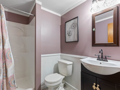 An image featuring mirror, plumbing fixture, sink, tap, property, bathroom sink, purple, bathroom, building, lighting at 491 Hillcrest Dr.