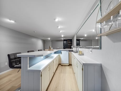 A kitchen at 104 Stony Mountain Rd featuring: building, cabinetry, wood, kitchen, interior design, house, flooring, floor, laminate flooring, hall