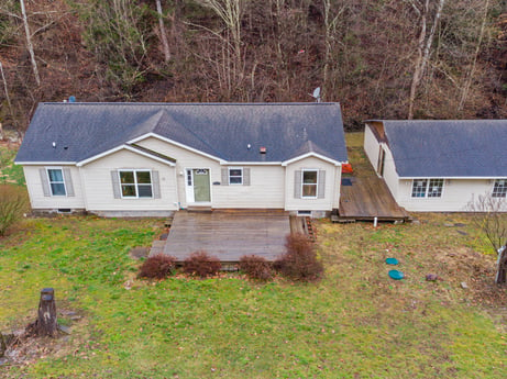 An image featuring property, window, plant, building, leaf, natural environment, house, wood, land lot, cottage at 1841 Lynch Rd.