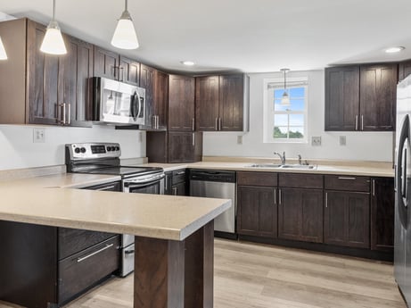A kitchen at 5442 Clarkstown Rd featuring: countertop, cabinetry, kitchen sink, property, sink, kitchen, tap, wood, lighting, interior design