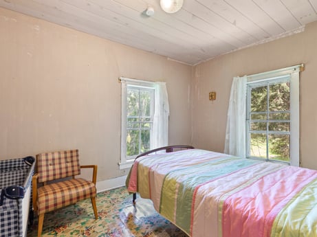 An image featuring furniture, property, window, azure, comfort, wood, interior design, fixture, textile, lighting at 1039 Old Bernice Rd.