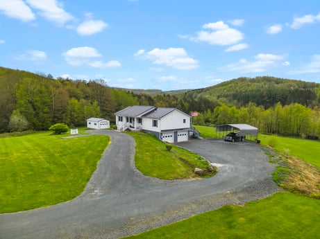 An image featuring cloud, sky, plant, mountain, green, building, natural landscape, tree, house, land lot at 993 Dieffenbach Rd.