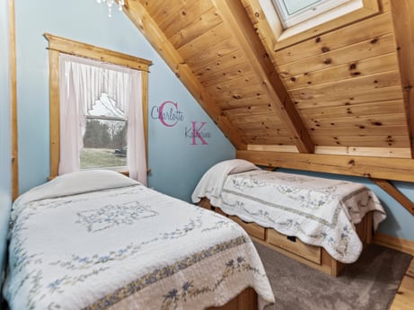 An image featuring furniture, building, comfort, wood, bed frame, textile, window, interior design, house, architecture at 144 Milton Ln.