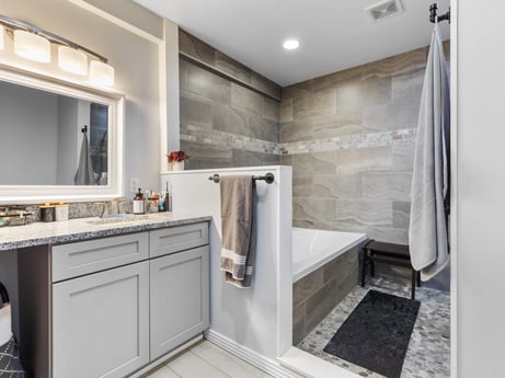 An image featuring cabinetry, building, countertop, interior design, wood, floor, flooring, tap, mirror, real estate at 17899 US-6.