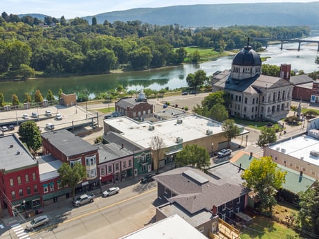 An image featuring water, property, building, window, sky, tree, architecture, urban design, neighbourhood, city at 213 Main St.