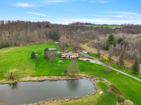 An image featuring water, sky, plant, water resources, cloud, ecoregion, natural landscape, natural environment, tree, highland at 1569 S Macafee Rd.