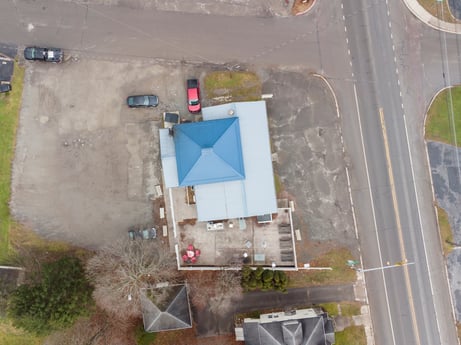 An image featuring property, plant, road surface, asphalt, land lot, urban design, slope, neighbourhood, residential area, vehicle at 199 State St.