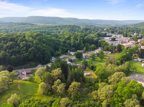 An image featuring sky, plant, cloud, green, nature, natural landscape, highland, tree, land lot, mountainous landforms at 138 T-329.
