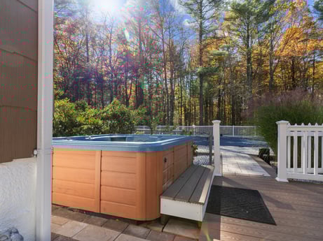 An image featuring plant, daytime, property, shade, wood, interior design, sunlight, house, tree, fence at 125 Rimstone Ct.