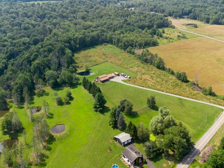 An image featuring ecoregion, green, natural landscape, natural environment, plant, tree, land lot, grassland, urban design, grass at 6583 N Rome Rd.