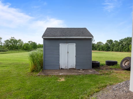 An image featuring sky, cloud, building, ecoregion, plant, tire, tree, wood, door, wheel at 5442 Clarkstown Rd.