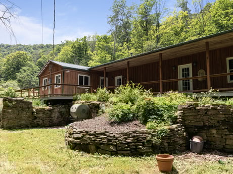 An image featuring plant, sky, property, window, tree, land lot, natural landscape, vegetation, grass, biome at 154 Fox Run Rd.