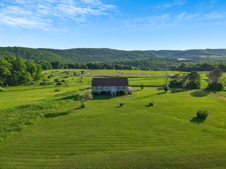 An image featuring cloud, sky, plant, natural landscape, tree, house, land lot, grass, mountainous landforms, mountain at 85 View Rd.