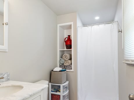 An image featuring bathroom cabinet, interior design, wood, fixture, sink, floor, shelving, real estate, flooring, hardwood at 62 Leons Rd.