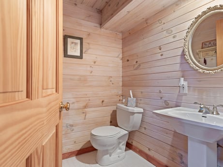 An image featuring brown, sink, property, plumbing fixture, mirror, tap, bathroom sink, purple, wood, bathroom at 1761 Brick House Rd.