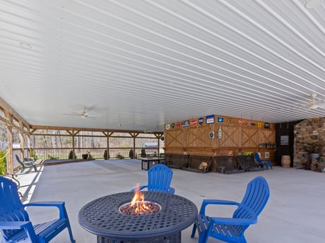 An image featuring furniture, blue, chair, building, table, interior design, shade, architecture, leisure, outdoor furniture at 4741 US-220.