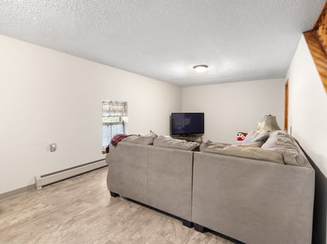 An image featuring property, building, cabinetry, comfort, fixture, wood, window, interior design, grey, floor at 62 Leons Rd.