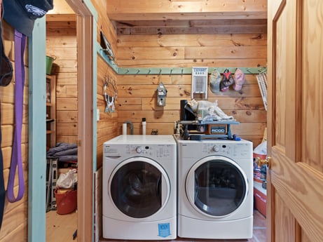 An image featuring brown, laundry room, clothes dryer, washing machine, property, laundry, wood, home appliance, major appliance, flooring at 1761 Brick House Rd.