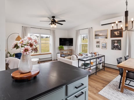 A kitchen at 18 Country View Dr featuring: furniture, property, cabinetry, picture frame, table, ceiling fan, wood, interior design, plant, kitchen