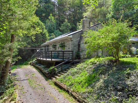 An image featuring plant, tree, natural landscape, wood, watercourse, track, railway, bridge, cottage, groundcover at 9224 PA-87.