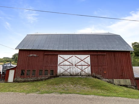 An image featuring cloud, sky, building, wood, house, land lot, grass, door, cottage, siding at 1863 Sopertown Rd.