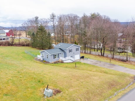 An image featuring plant, sky, building, cloud, tree, land lot, grass, house, neighbourhood, landscape at 18 Country View Dr.