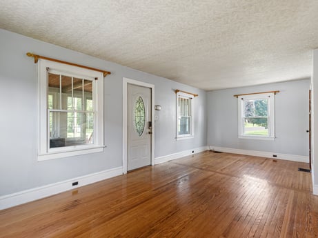 An image featuring window, fixture, wood, paint, architecture, hall, flooring, wood stain, floor, wall at 132 Wilbur St.