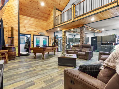 An image featuring property, furniture, table, picture frame, wood, couch, interior design, architecture, floor, flooring at 17899 US-6.