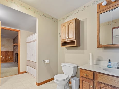 An image featuring mirror, bathroom cabinet, plumbing fixture, sink, wood, cabinetry, interior design, tap, bathroom, architecture at 74 Susquehannock Trail.