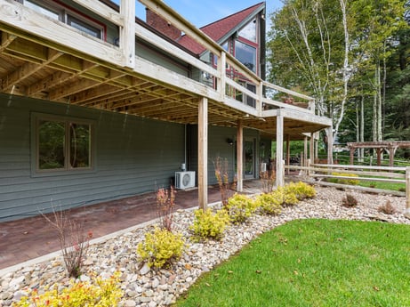 An image featuring plant, property, building, window, flower, land lot, tree, urban design, shade, cottage at 276 Mountain View Ln.