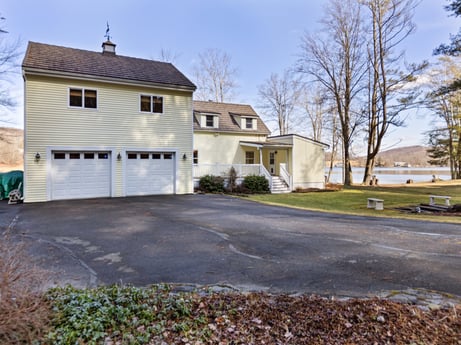 An image featuring sky, plant, building, window, tree, road surface, asphalt, house, land lot, neighbourhood at 199 S Lake Rd.