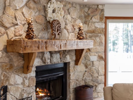 An image featuring property, wood, window, interior design, living room, wall, twig, gas, hardwood, natural material at 125 Rimstone Ct.