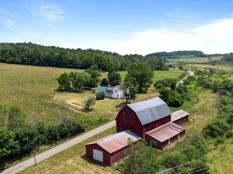 An image featuring cloud, plant, sky, building, window, ecoregion, natural landscape, tree, house, land lot at 1863 Sopertown Rd.