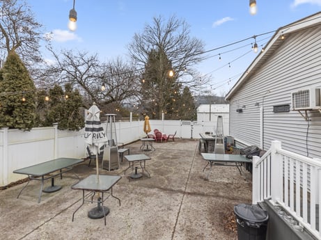 An image featuring sky, cloud, building, window, tree, table, road surface, lighting, plant, architecture at 199 State St.