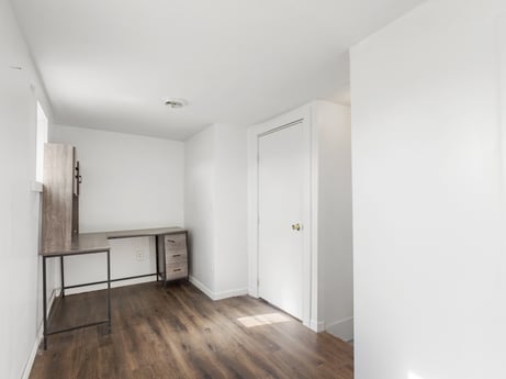 An image featuring building, fixture, wood, hall, flooring, floor, door, wood stain, laminate flooring, hardwood at 132 Wilbur St.