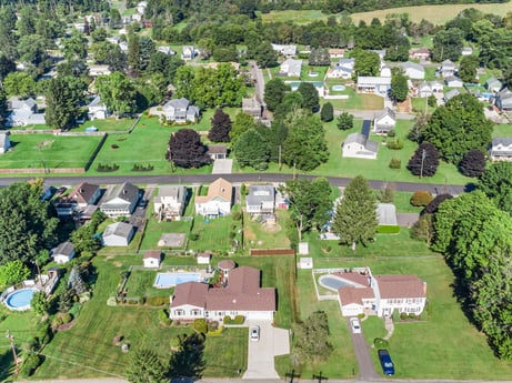 An image featuring plant, property, tree, land lot, urban design, building, grass, neighbourhood, biome, natural landscape at 132 Wilbur St.
