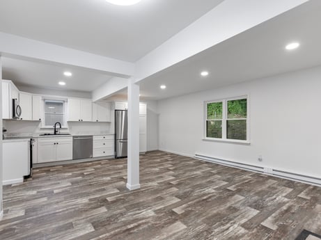 An image featuring building, window, fixture, wood, flooring, hall, cabinetry, floor, interior design, grey at 127 Shore Dr.