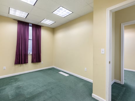 An image featuring building, fixture, wood, architecture, interior design, hall, floor, flooring, paint, hardwood at 213 Main St.