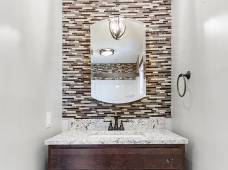 An image featuring mirror, makeup mirror, cabinetry, shelf, rectangle, wood, drawer, building, interior design, line at 132 Wilbur St.