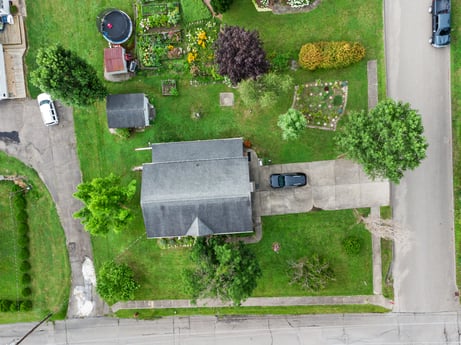 An image featuring plant, property, green, land lot, urban design, vegetation, house, biome, shrub, building at 105 Thomas St.