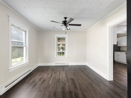 An image featuring property, window, ceiling fan, fixture, wood, hall, interior design, floor, flooring, line at 203 Harrison St.