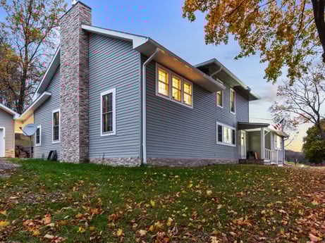 An image featuring plant, sky, property, window, building, nature, tree, house, wood, land lot at 17899 US-6.