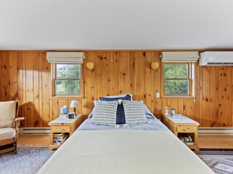 An image featuring furniture, building, table, chair, wood, interior design, window, flooring, tree, house at 130 Haighs Pond Rd.