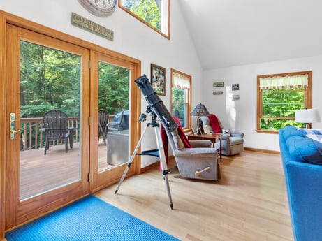 An image featuring property, blue, picture frame, azure, comfort, wood, flooring, interior design, floor, leisure at 459 Pine Hill Dr.