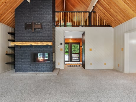 An image featuring building, architecture, interior design, floor, wood, flooring, real estate, door, fixture, facade at 276 Mountain View Ln.