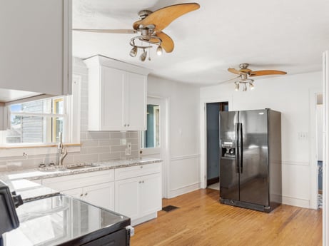 A kitchen at 132 Wilbur St featuring: cabinetry, property, kitchen sink, countertop, sink, wood, interior design, kitchen, floor, tap