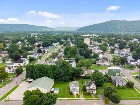 An image featuring sky, plant, cloud, property, building, green, nature, tree, urban design, neighbourhood at 203 Harrison St.