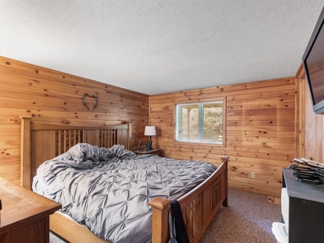 An image featuring building, furniture, cabinetry, comfort, window, wood, table, house, interior design, bed frame at 125 Marcy Rd.