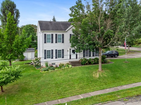 An image featuring plant, property, building, window, tree, sky, house, land lot, vehicle, grass at 105 Thomas St.